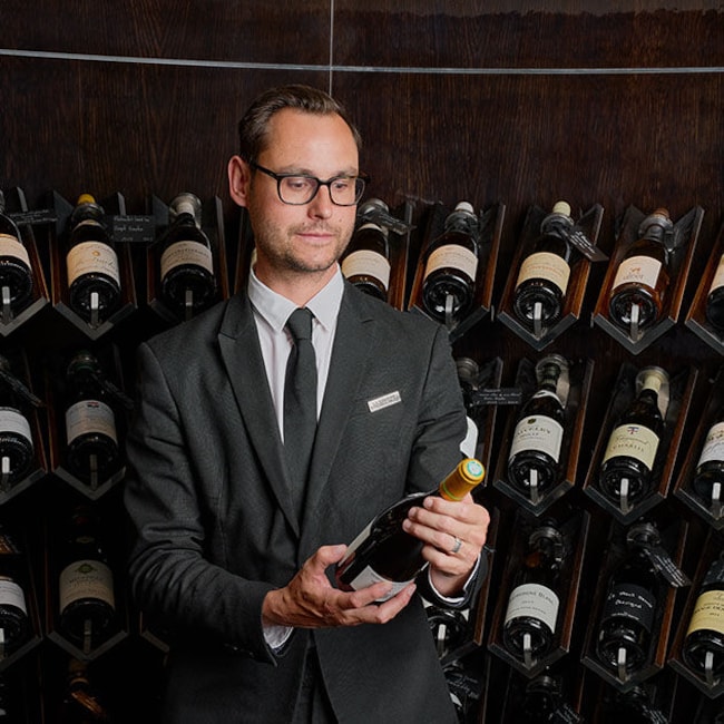 Vianney, responsable de La Cave de La Grande Epicerie Rue de Sèvres