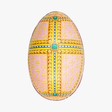 L'œuf Fabergé en métal, garni de petits oeufs en chocolats Le Petit Duc