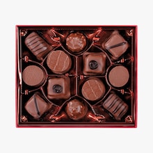 Assortiment exclusif de 12 chocolats au lait Maxim’s de Paris